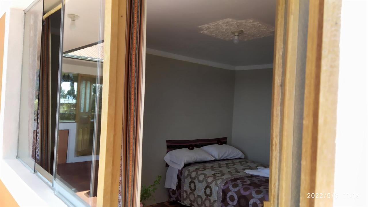 Tikawasi Homestay Comunidad Pueblo Isla Amantani Jose Luis Ocosuyo Buitenkant foto